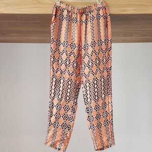 BCBGeneration Orange and Black Patterned Cropped Pants
